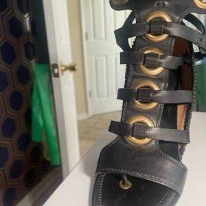 Salvatore Ferragamo Black Heels with Gold Rings